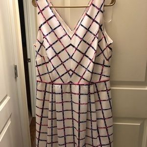 White dress with purple and pink checkers print